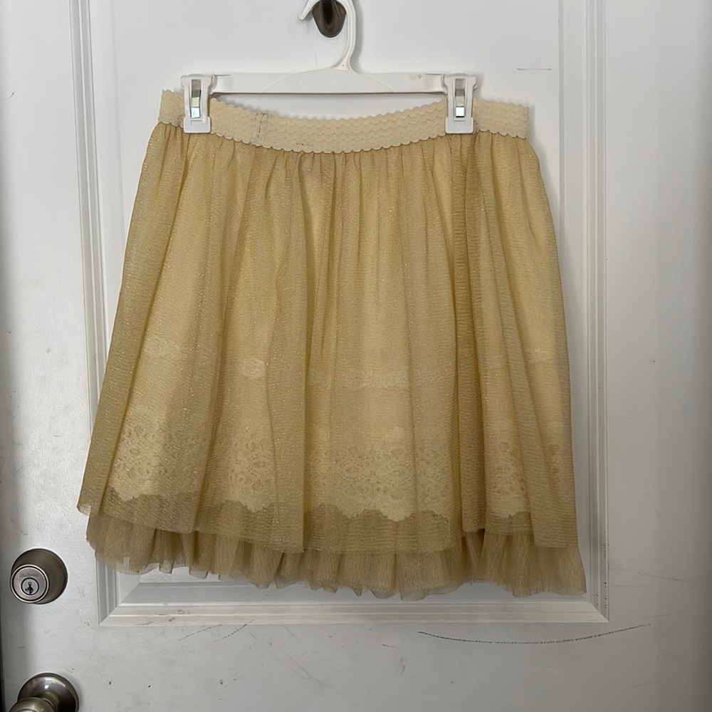 Cream colored toole skirt